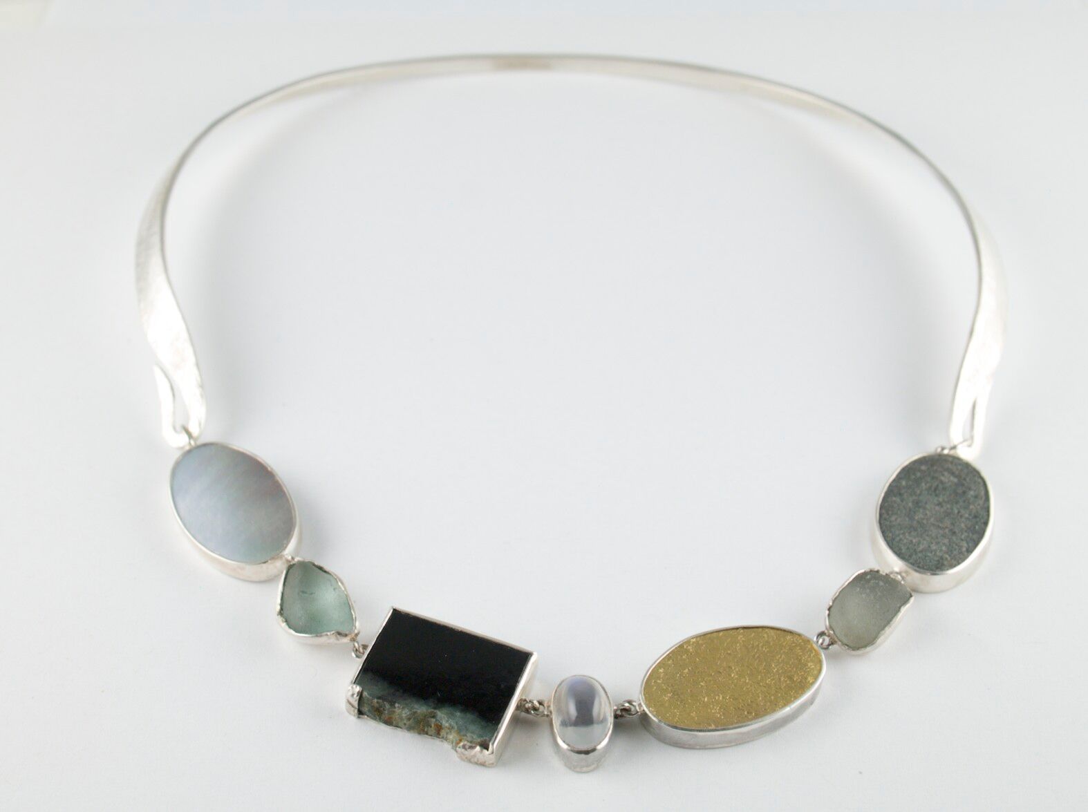 Found pebble necklace with silver and gold elements