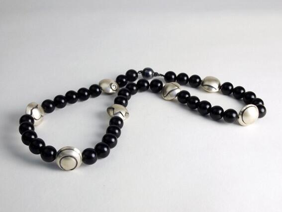 Seven Chakras and their symbols in silver