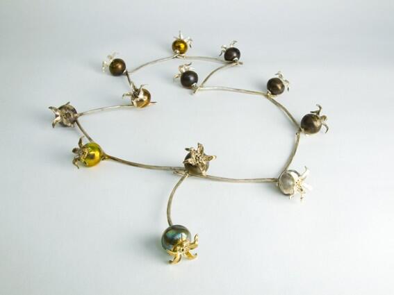 Sterling silver rosehips threaded like the daisy chains we played with as children