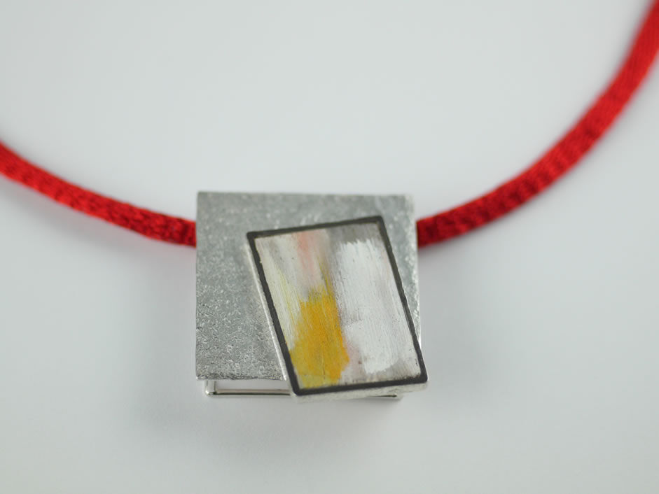 Yellow painted pendant in Stg Silver on Titanium