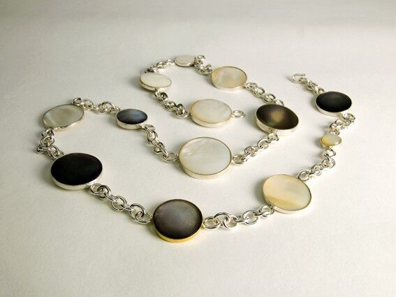 Mother of pearl 13 moons in a year set in silver on silver chain 