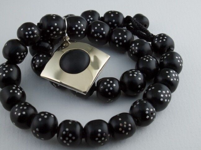 Australian Black Jade set in Gold and Silver suspended from inlayed beads