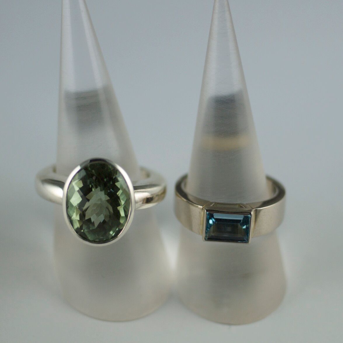 Aquamarine and praisialite silver and gold Rings