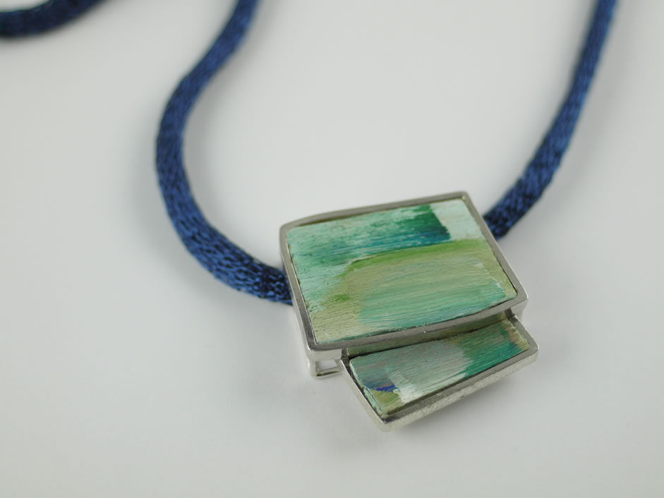 BlueGreen Painted pendant set in Stg Silver on Titanium