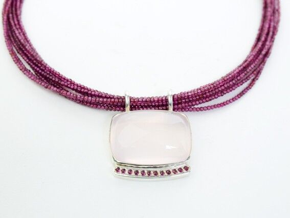 Cabachon Rose Quartz set in silver on Tourmaline beads