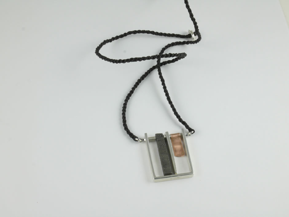 Meteorite Silver & Pink Gold necklace on cord