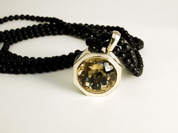 Smokey Quartz set in Sterling silver on Onyx beads