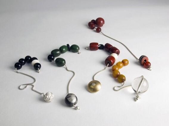 Playful contemporary hand Komboloi in Copal, Amber & Silver