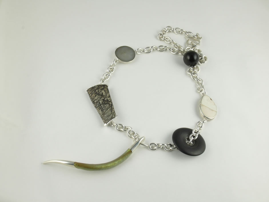 Necklace with Golden Coral ,Mother of pearl, Onyx and Buffalo horn in Sterling silver