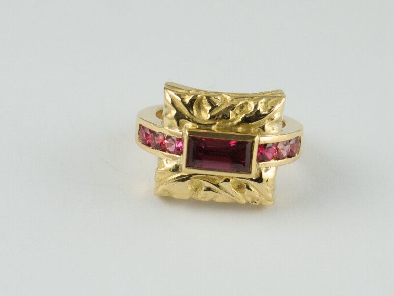 Ring - Carved 22ct Gold with red and pink spinels