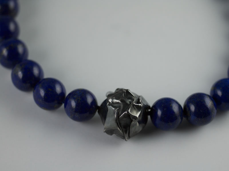 Lapis Lazuli beads and scrunched Silver centre piece